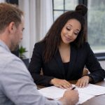 Nicole McGowan Fort Walton Beach Agent with a client