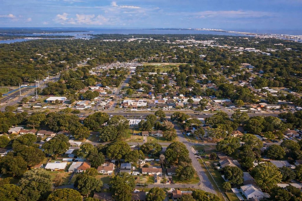 Aerial view of established single-family neighborhoods in Mary Esther, FL
