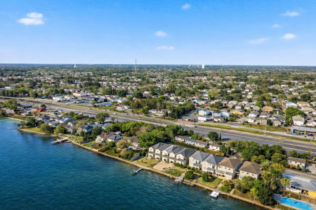 Mary Esther townhomes and neighborhoods along the water, with Highway 98 behind