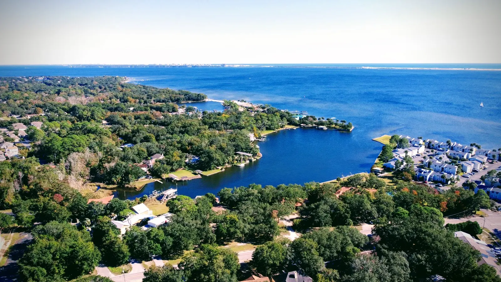 Aerial view of a bayou opening into Choctawhatchee Bay near Shalimar