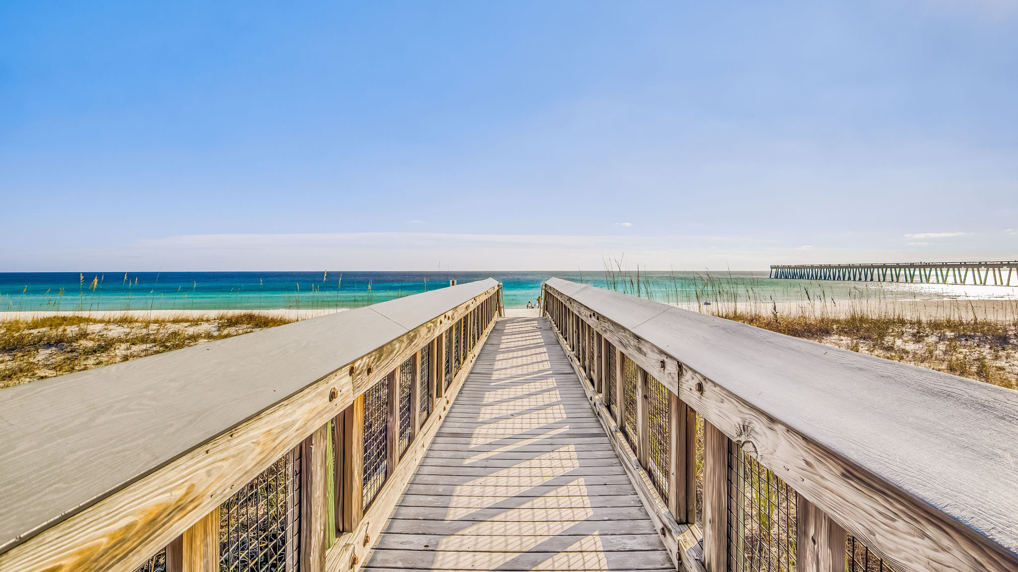 Wooden boardwalk leading to Navarre Beach and the Gulf