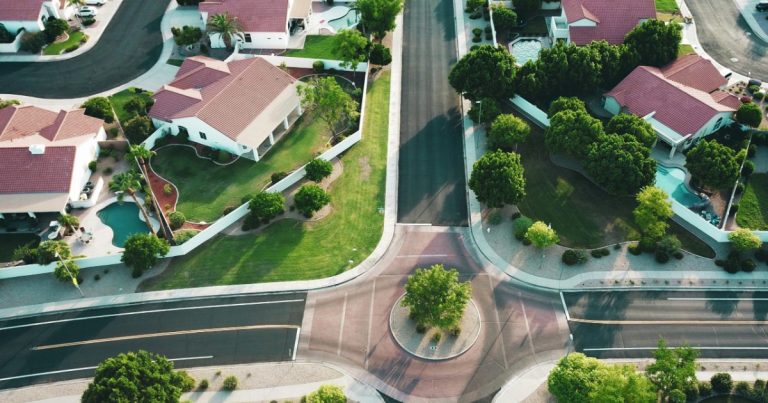 Aerial view of a Florida neighborhood with roads, sidewalks and pools, the kind of infrastructure a CDD pays for